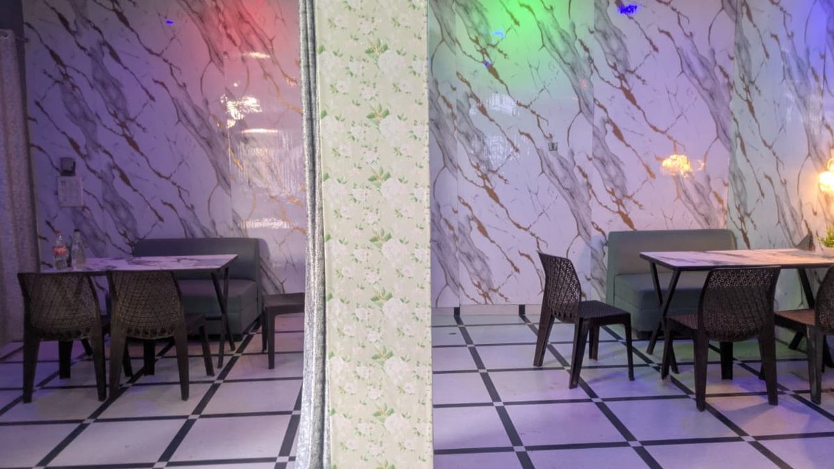 Seating area inside Golden Pizza Cafe, Bahal